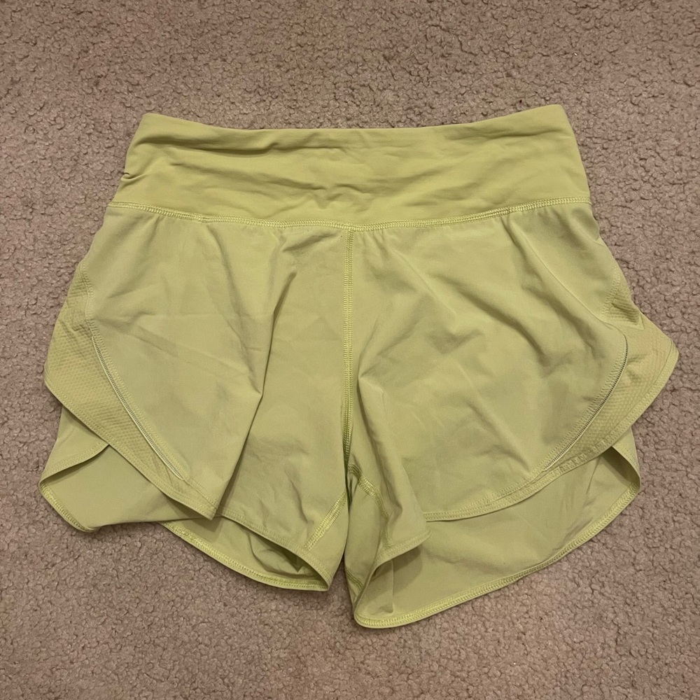 Lululemon women’s yellow/green running shorts size 4